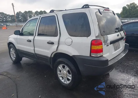2003 Ford Escape Xlt z USA, uszkodzony, nr VIN 1FMYU03193KA72637